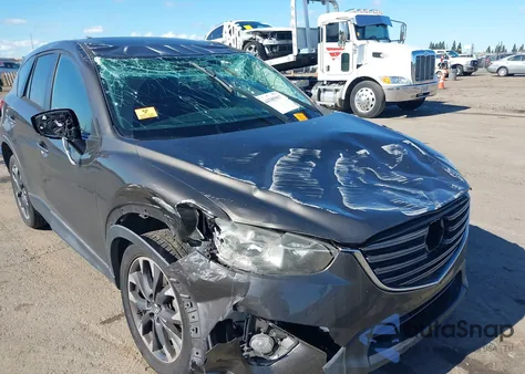 2016 Mazda Cx-5 Grand Touring z USA, uszkodzony, nr VIN JM3KE2DY6G0660406